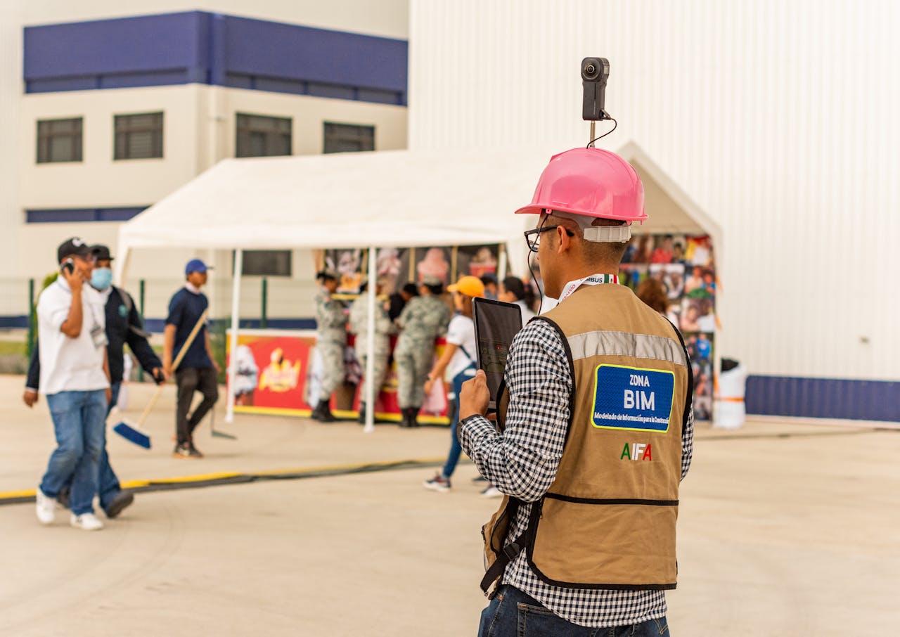 Man Wearing Pink Helmet with Camera